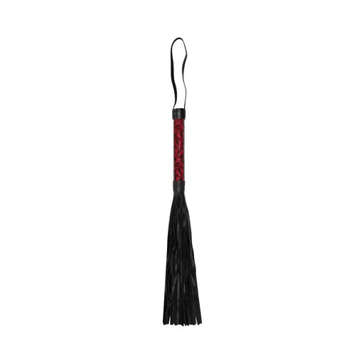 Burgundy faux-leather whip with diamond pattern handle and black leather tassels, featuring a wrist loop.