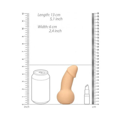 Beige stress ball shaped like a playful phallic symbol, shown with size comparison to a soda can and lipstick.