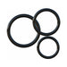 Set of three black silicone O-rings in varying sizes for strap-on harness compatibility and secure fit.