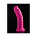 Bright pink realistic dildo with curved shape and suction cup base on black background