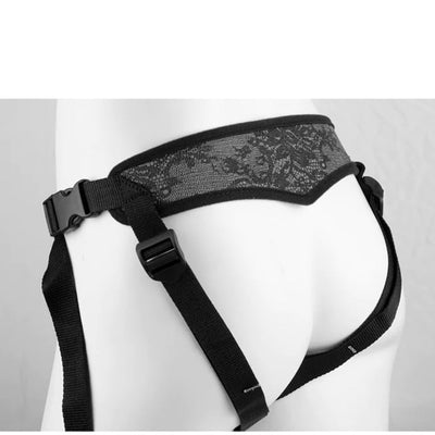 Black lace and nylon adjustable strap-on harness displayed on a white mannequin from the back.