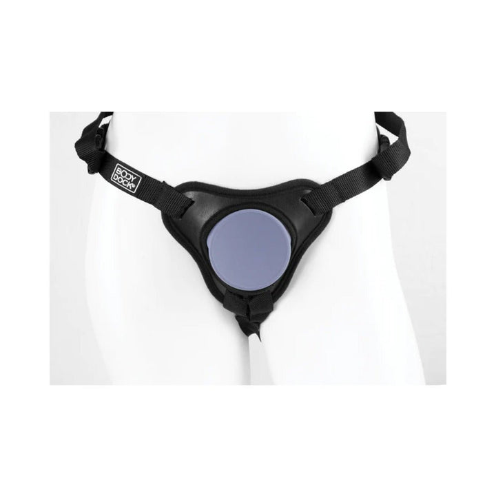 Black adjustable Body Dock SE strap-on harness with silicone docking plate on white mannequin.