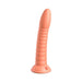 Smooth peach-colored silicone dildo with ribbed texture and suction cup base standing upright on white background.