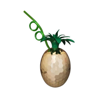 Gold pineapple-shaped cup with textured surface and green leafy top, featuring a curly green straw.