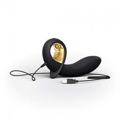 Black and gold inflatable vibrator with USB charging cable on white background.