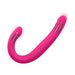 Flexible pink double-ended vibrator with dual motors, designed for versatile and safe intimate stimulation.