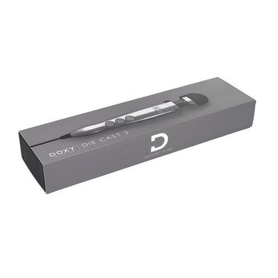 Doxy Die Cast 3 compact wand vibrator in sleek silver packaging with product image and branding on box