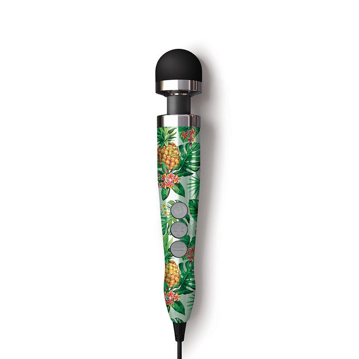 Compact Doxy Die Cast 3 wand massager with tropical pineapple and leaf pattern, black silicone head, and control buttons.