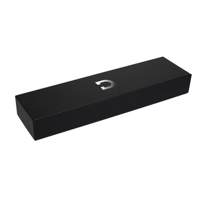 Black rectangular box packaging with silver Doxy logo on top for compact wand massager