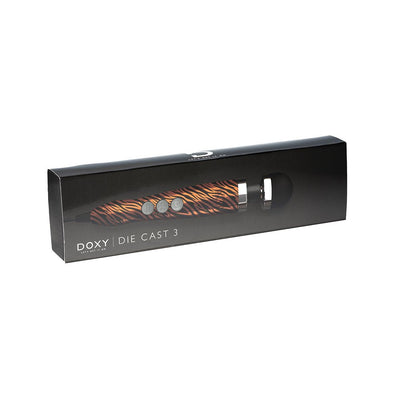 Doxy Die Cast 3 compact wand massager with tiger pattern in sleek black packaging.