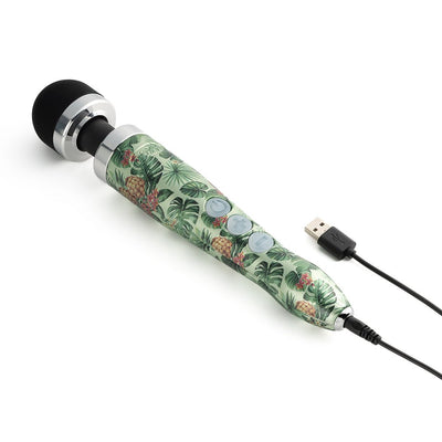Rechargeable Doxy Die Cast 3R wand massager with pineapple and tropical leaf pattern and USB charging cable.