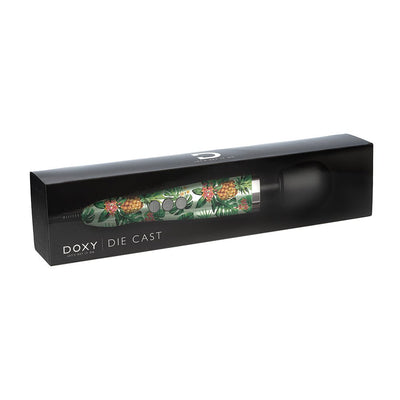 Doxy Die Cast Massager in pineapple print with black silicone head in sleek black packaging box.