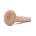 Beige 5-inch realistic mini dildo with suction cup base lying on white background.