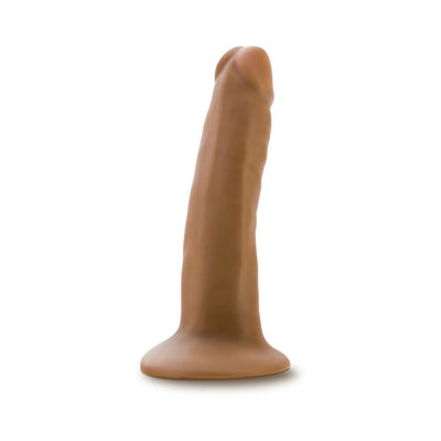 Vanilla-colored 5.5 inch realistic dildo with suction cup base standing upright on white background.