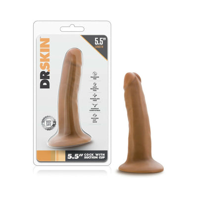 Vanilla-colored 5.5 inch realistic dildo with suction cup base displayed next to its clear packaging.