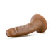 Vanilla-colored 5.5 inch realistic dildo with suction cup base lying on white background.