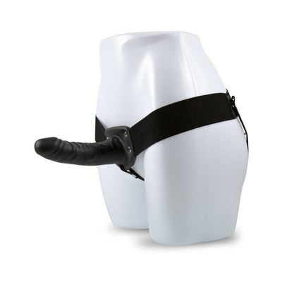 Black 6-inch hollow strap-on with adjustable waistband displayed on white mannequin hips.