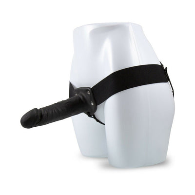 Black 7-inch hollow strap-on with adjustable waistband displayed on a white mannequin torso.
