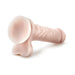 Realistic flesh-toned dildo with textured shaft and suction cup base for hands-free use on white background.