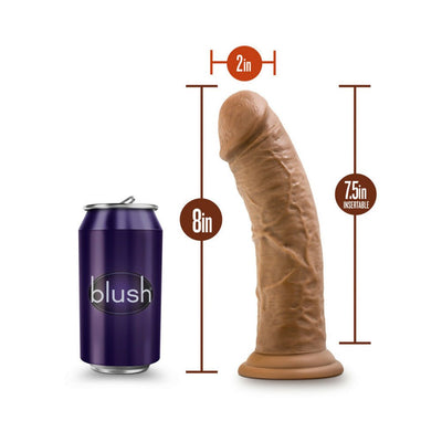 Chocolate-colored realistic dildo with suction cup base, 8 inches long and 2 inches wide, shown next to a soda can for scale.