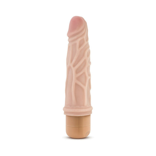 Beige realistic textured vibrator with twist dial base for multi-speed control, measuring 7.25 inches.