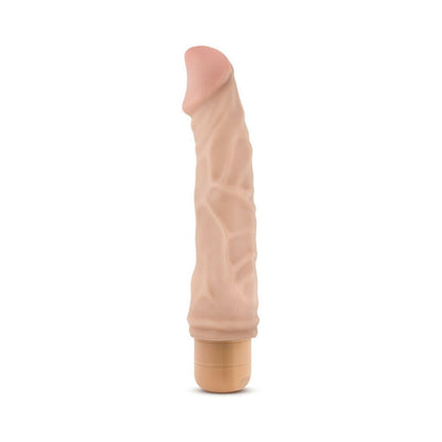 Beige realistic textured vibrator with a prominent head and twist-dial base on a white background.