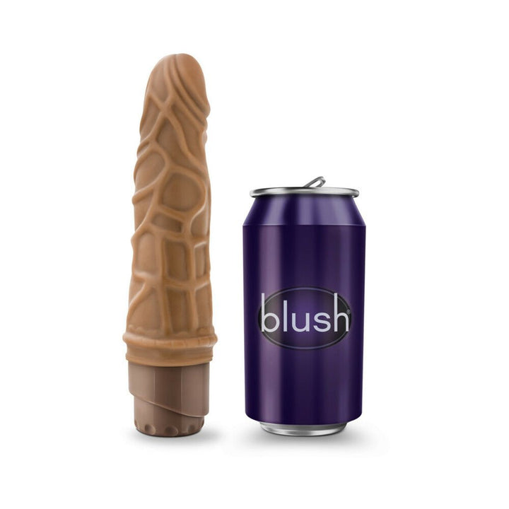 Mocha-colored 7.25 inch vibrating cock with textured surface next to a purple Blush branded can for size comparison.