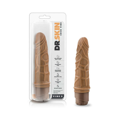 Mocha-colored realistic vibrating cock vibe with textured surface shown in and out of clear retail packaging.