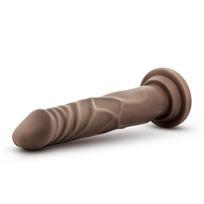 Realistic brown silicone dildo with suction cup base, detailed texture, and a smooth, contoured shaft.
