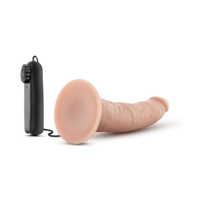 7 inch realistic vibrating dildo in flesh tone with suction cup base and wired remote control on white background.
