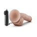 Realistic flesh-toned vibrating dildo with suction cup base and black wired remote control on white background.