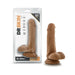 Tan 6.5-inch realistic dildo with suction cup base displayed next to its clear retail packaging.