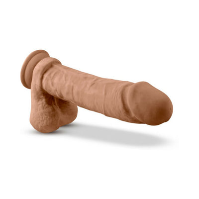 Realistic mocha silicone dildo with suction cup base and textured shaft for versatile use.