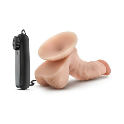 Vanilla-colored 6.5-inch vibrating dildo with suction cup base and wired remote control on white background.
