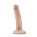 Vanilla-colored realistic silicone dildo with suction cup base standing upright on white background
