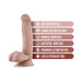 Beige realistic dildo with suction cup base and balls, highlighting features like soft feel, harness compatibility, and body-safe materials.