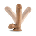 Tan realistic dildo with balls and suction base shown in front of two lighter shade versions on white background