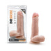 Realistic 7.25-inch flesh-toned dildo with suction cup base displayed next to its clear packaging.