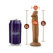 Vanilla-colored 6-inch realistic dildo with suction base shown next to a soda can for size comparison.