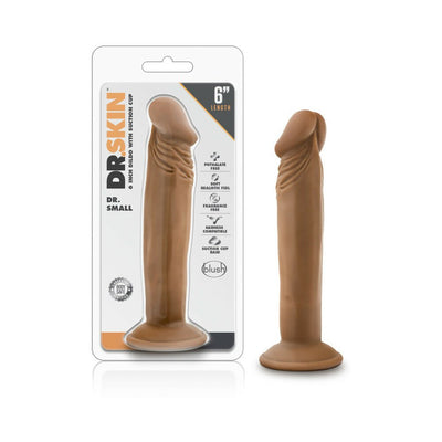 Vanilla-colored 6-inch realistic dildo with suction cup base shown in and out of clear packaging.