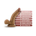 Tan realistic dildo with suction cup base and textured details, highlighting features like G-spot curve and body-safe materials.