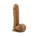 Realistic tan dildo with detailed texture, balls, and suction cup base for hands-free use and harness compatibility.