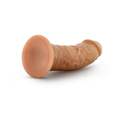Mocha-colored 8-inch self-lubricating dildo with suction cup base lying on white surface.