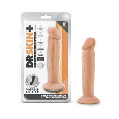 Dr. Skin Plus 6-inch vanilla-colored posable dildo with suction cup base shown next to its retail packaging.