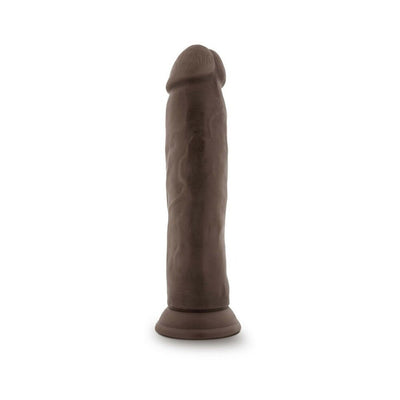 Posable 9-inch chocolate-colored dildo with realistic texture and suction cup base standing upright on white background.