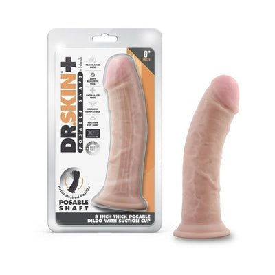 Vanilla-colored 8-inch posable dildo with suction cup base displayed next to its branded packaging.