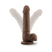 Chocolate-colored realistic dildo with suction cup base shown in upright and angled positions on white background.