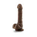 Chocolate-colored realistic dildo with suction cup base standing upright on white background.