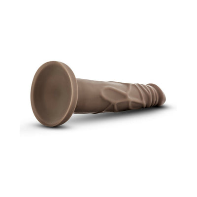 Chocolate-colored realistic dildo with suction cup base, textured veins, and lifelike design, 7.5 inches long.