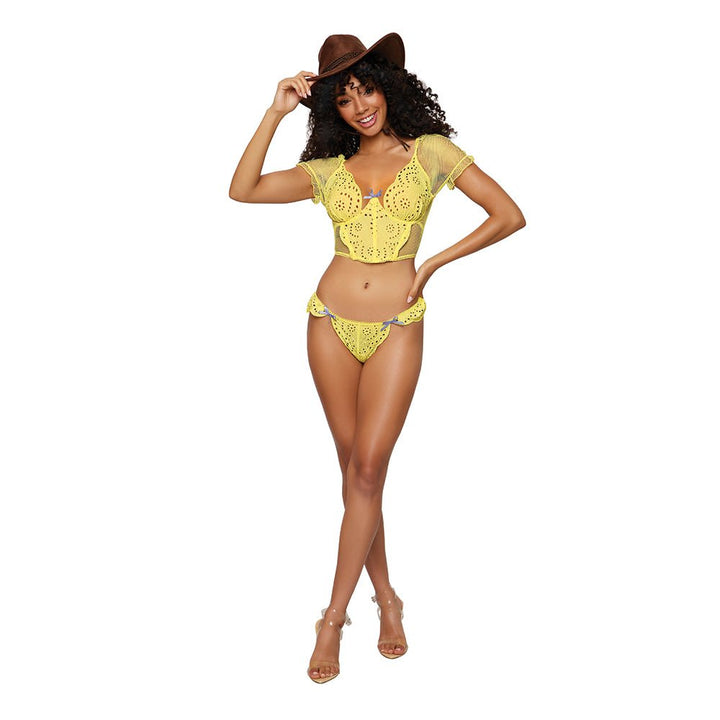 Model wearing citrus yellow eyelet lace bustier and matching G-string with mesh sleeves and brown hat